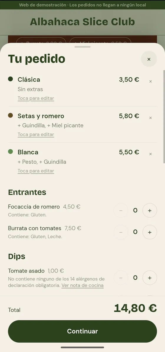 Móvil con la carta de Albahaca Slice Club y el pedido abierto: Clásica, Setas y romero y Blanca, con un total de 14,80 euros.